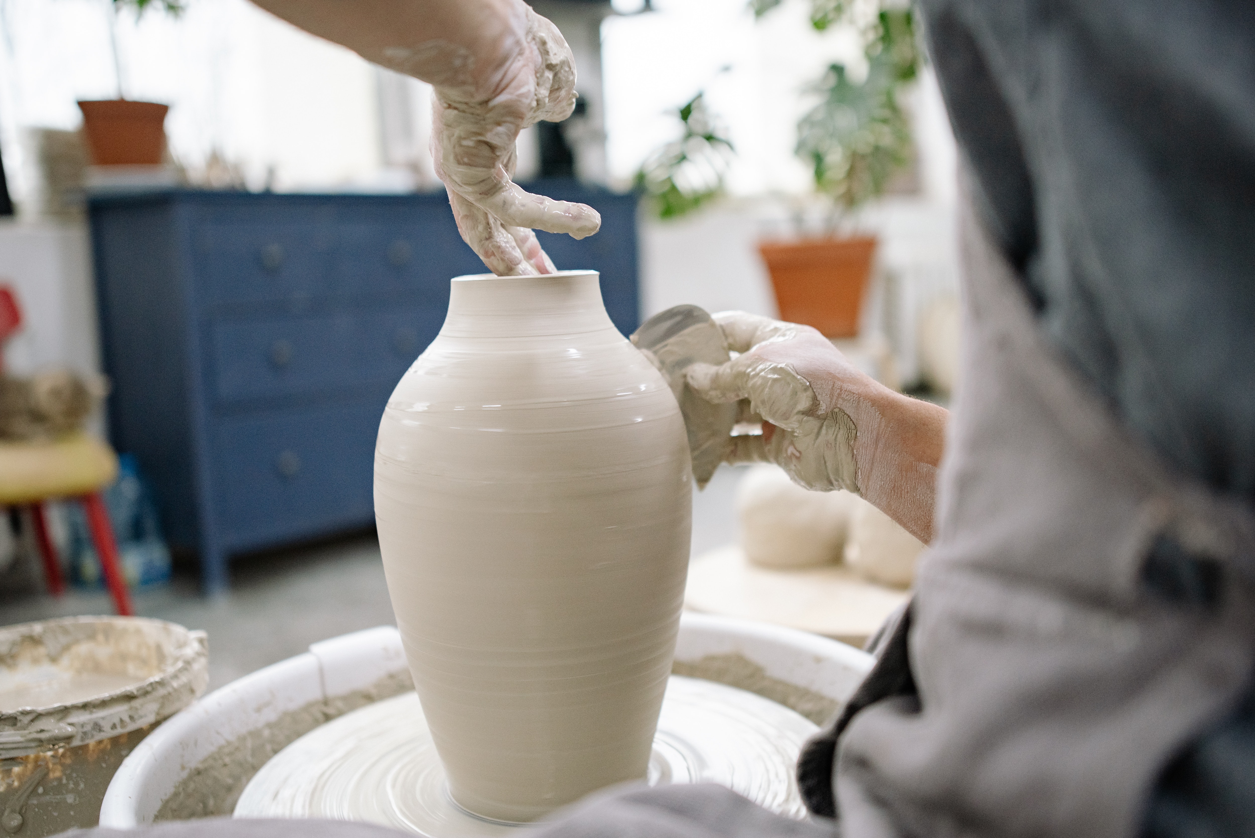 Alex making clay bowl